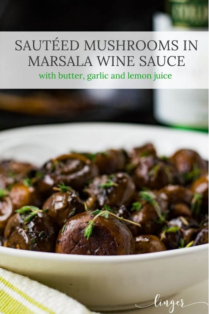 Sauteed mushrooms with thyme sprinkles over the top sit in a white bowl.