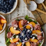 fresh peach arugula salad with prosciutto and blueberries